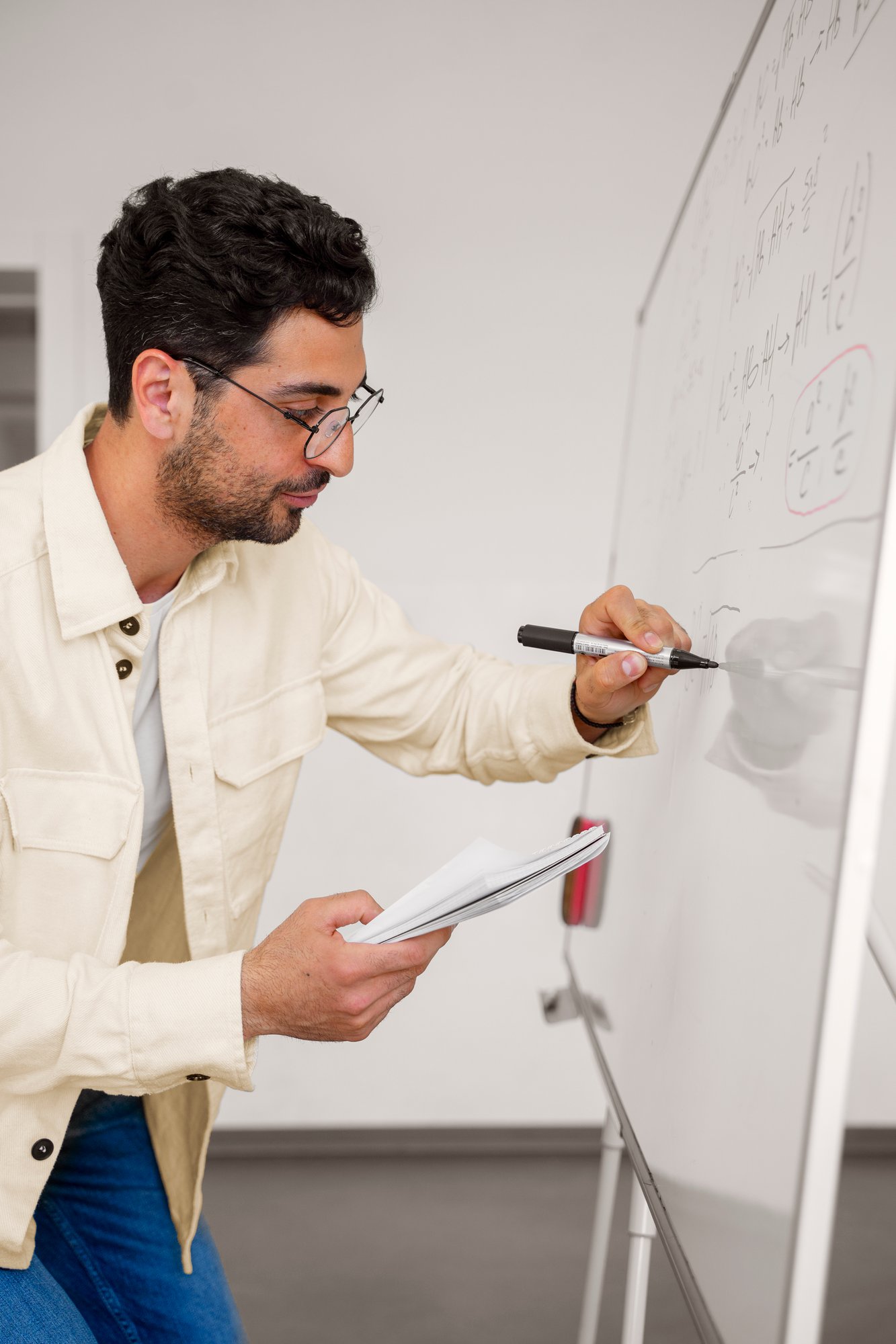 medium-shot-man-writing-whiteboard